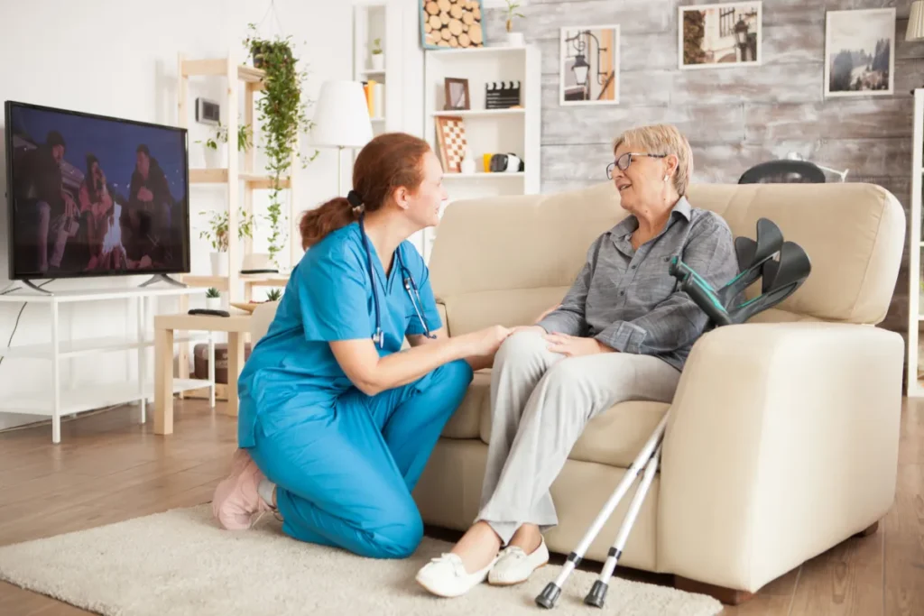 Nurse comforting elderly woman
